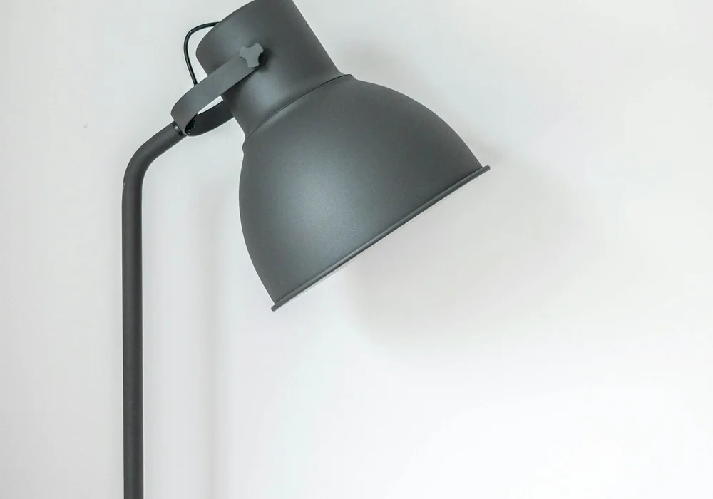 Energy-efficient LED downlight fixture securely seated in false ceiling cut-out